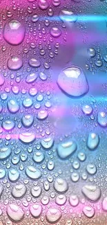 Vibrant water droplets on a colorful background in pink, blue, and purple hues.