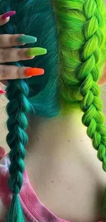 Bright green and blue braided hairstyle with colorful nails showcased as a mobile wallpaper.