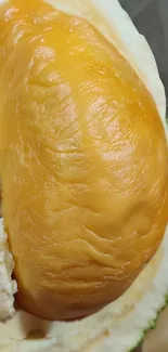 Close-up of vibrant durian fruit texture.