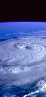 Mobile wallpaper featuring Earth from space with a swirling storm pattern.