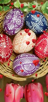 Colorful Easter eggs in a basket with red tulips and hearts.