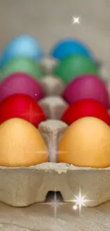 Colorful eggs arranged in a carton, showcasing various vibrant hues.