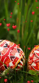 Easter eggs on green grass with red heart shapes around.