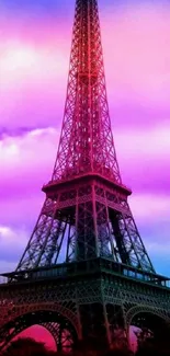 Vibrant pink and blue Eiffel Tower wallpaper with twilight sky.