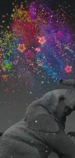 Grayscale elephant with vibrant paint splashes, creating a unique art wallpaper.