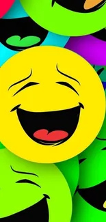 Vibrant, colorful emoji smile wallpaper with laughing faces.