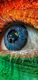 Close-up of a vibrant colored eye with orange and green accents.