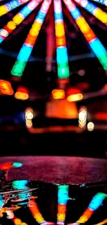 Vibrant Ferris wheel lights with reflections at night.