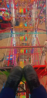 Colorful Ferris wheel view from above with boots.