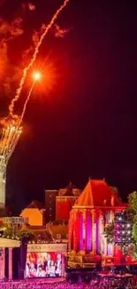 Vibrant nighttime festival with fireworks and church backdrop.