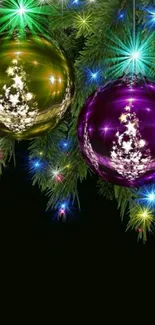 Colorful Christmas baubles hanging on a festive tree branch.