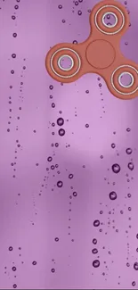 Purple wallpaper with fidget spinner and water droplets design.