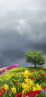 Vibrant field with flowers, tree, and stormy sky.