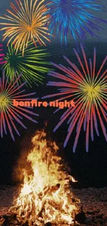 Colorful fireworks over a bonfire night celebration.