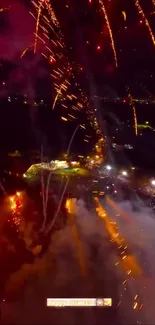 Colorful fireworks lighting up the night sky in a festival scene.