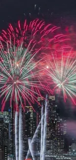 Vibrant fireworks over a cityscape at night.