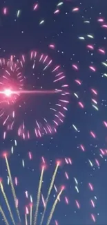 Colorful fireworks explode against a starry night sky in this vibrant wallpaper.