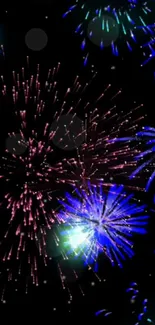 Vibrant mobile wallpaper of colorful fireworks in the night sky background.