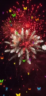 Vibrant red fireworks bursting in the night sky.