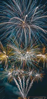 Vibrant fireworks display against a dark blue night sky.