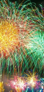 Vibrant fireworks display lighting up the night sky in a burst of colors.