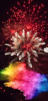 Colorful fireworks display with vibrant red explosions at night.