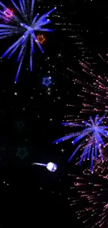 Colorful fireworks bursting in the night sky over a dark background.