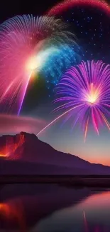 Colorful fireworks illuminate a mountain with a lake reflection at night.