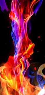 Vibrant red, orange, and purple flames on a black background wallpaper.