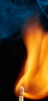 Matchstick flame with blue smoke on a dark background.