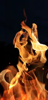 Dynamic fiery flames on a dark background for mobile wallpaper.