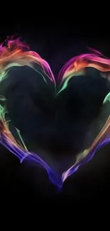 Vibrant flaming heart with colorful flames on a black background.