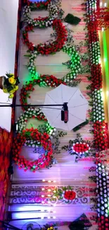 Colorful floral backdrop with vivid lights and decorations.