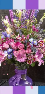 Vibrant purple and pink floral bouquet in a decorative vase wallpaper.