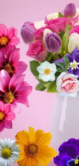 Bright floral bouquet with pink roses, tulips, and daisies in a white vase.