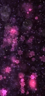 Dark purple galaxy wallpaper with pink flowers and stars.