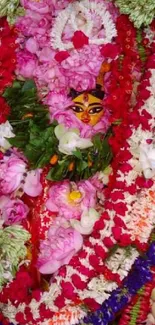 Floral garland surrounding vibrant idol.