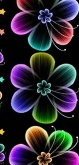 Neon floral wallpaper with colorful flowers on black background.