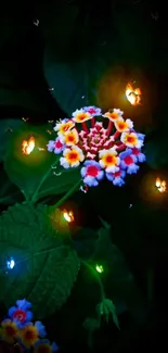 Vibrant flowers glowing against a dark background with colorful lights.