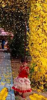 Child with flowers in a vibrant garden pathway.