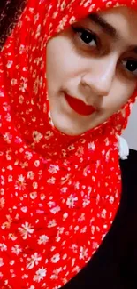 Vibrant red floral hijab mobile wallpaper.