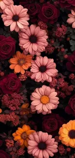 Mobile wallpaper with red and orange flowers in a dark floral pattern.