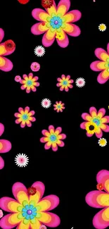 Vibrant floral pattern with colorful flowers on black background.