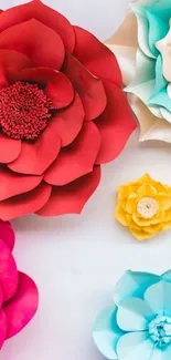 Vibrant floral wallpaper with colorful paper flowers.