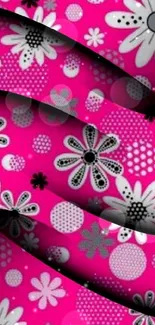 Bright pink wallpaper with playful floral pattern.