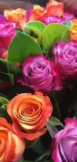 Colorful bouquet of orange and purple roses.