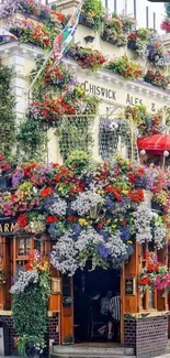 Charming pub adorned with vibrant flowers.