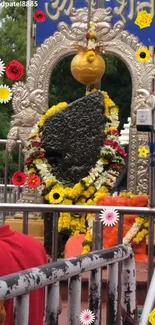 Vibrant floral stone monument with yellow accents.