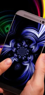 Vibrant fractal wallpaper on mobile screen.