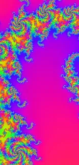 Vibrant fractal pattern in neon colors on wallpaper.